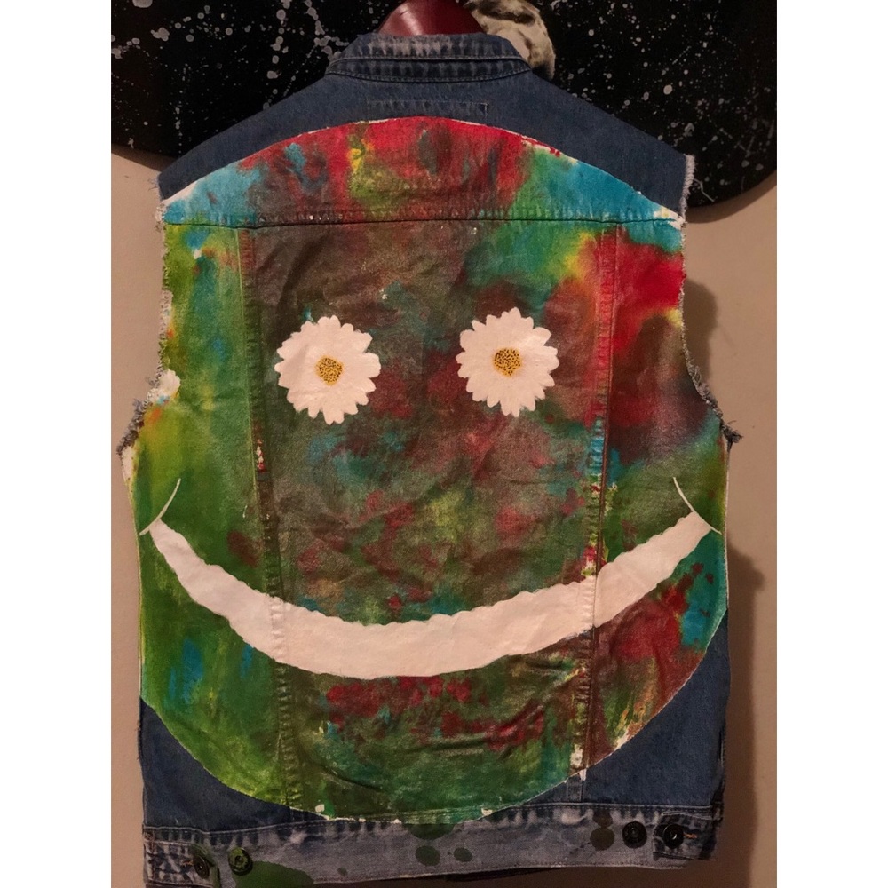 Custom painted denim vest size L in men.